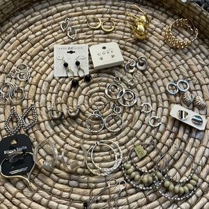 23 pairs of costume jewelry earrings gold and silver tone